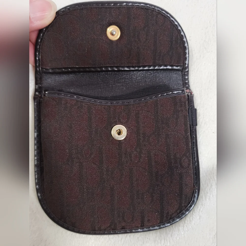 Christian Dior Trotter coin pouch.